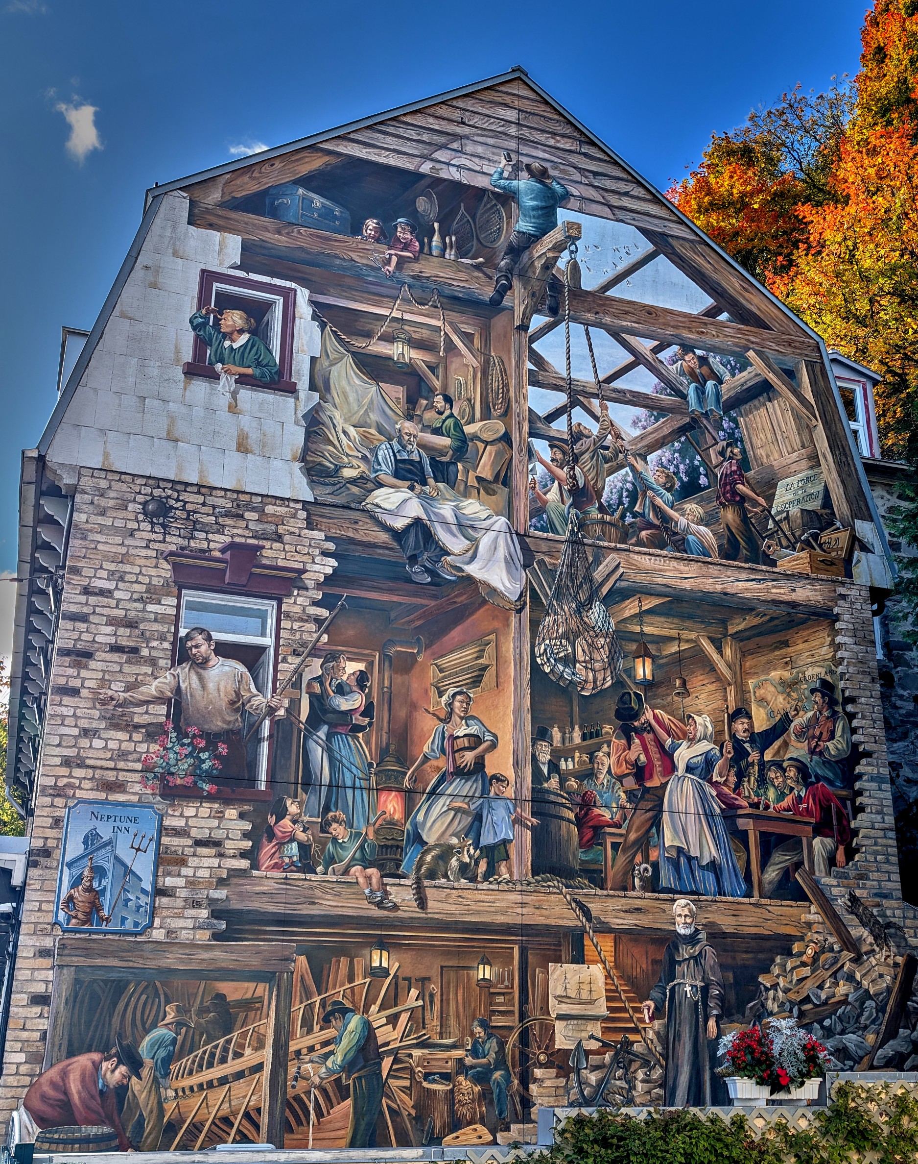 Vermont and Quebec 50 Large trompe-l?oeil painting covers a tall building end wall, showing people, balconies and period architectural scenes.